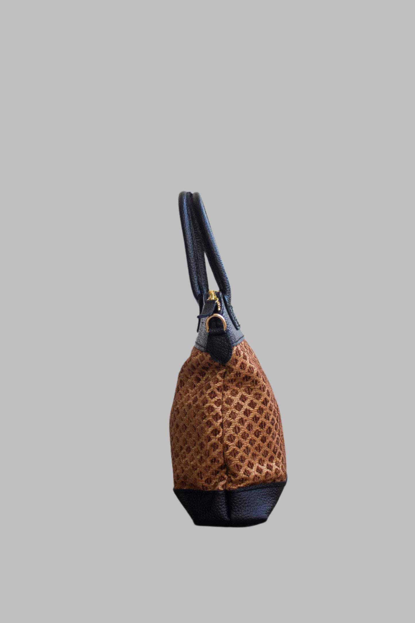 Weekend Kilim Genuine Leather Bag is Handcrafted in Old Cairo, Egypt, This bag is one of a kind masterpiece, made from vintage fabrics and genuine leather to embody the essence of sustainable luxury.a gift to the world of Ancient craftsmanship meeting modern functionality. A statement of creativity, cultural awareness and limitless style.