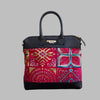 Weekend Kilim Genuine Leather Bag is Handcrafted in Old Cairo, Egypt, This bag is one of a kind  masterpiece, made from vintage fabrics and genuine leather to embody the essence of sustainable luxury.a gift to the world of Ancient craftsmanship meeting modern functionality. A statement of creativity, cultural awareness and limitless style.
