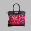 Weekend Kilim Genuine Leather Bag is Handcrafted in Old Cairo, Egypt, This bag is one of a kind  masterpiece, made from vintage fabrics and genuine leather to embody the essence of sustainable luxury.a gift to the world of Ancient craftsmanship meeting modern functionality. A statement of creativity, cultural awareness and limitless style.