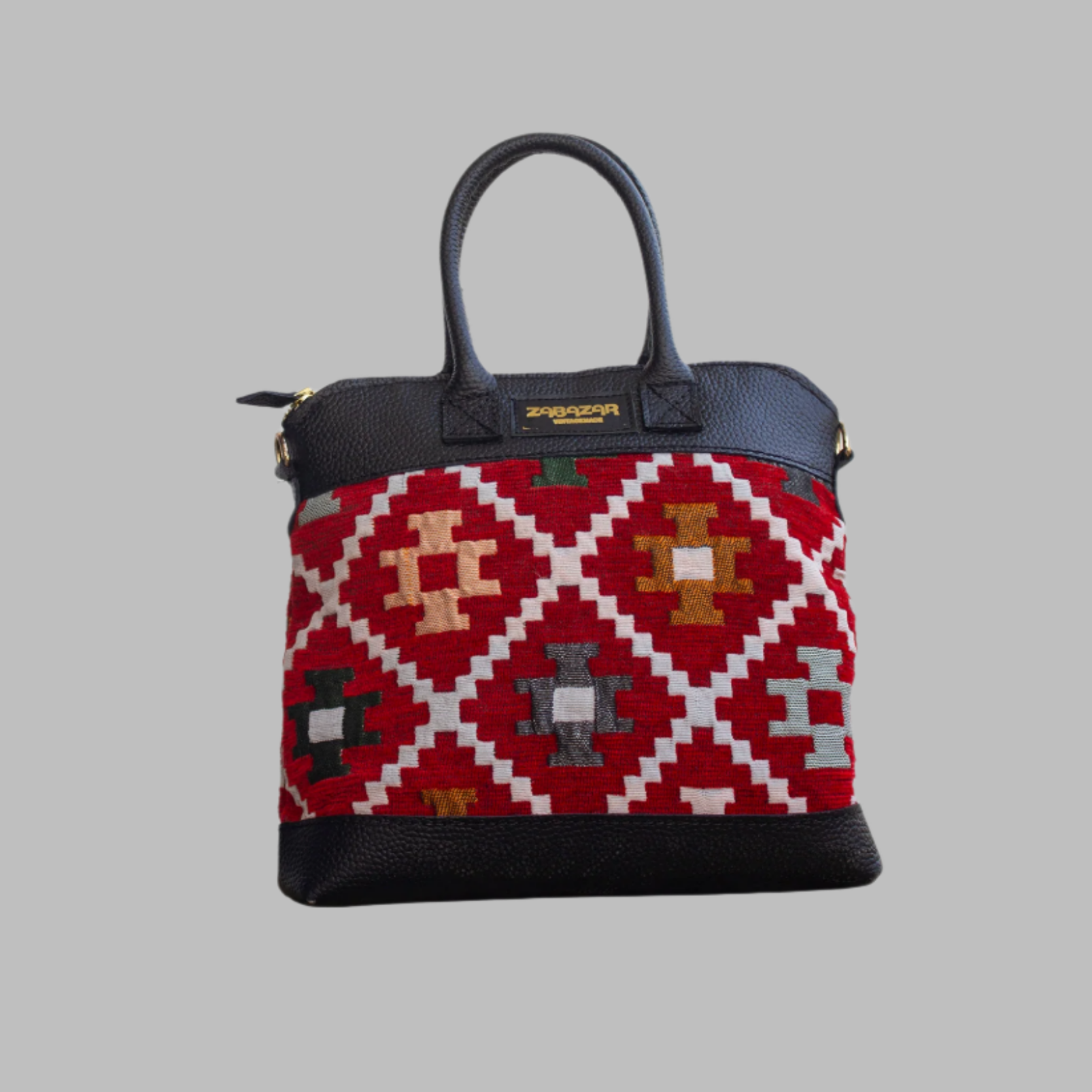 Weekend Kilim Genuine Leather Bag is Handcrafted in Old Cairo, Egypt, This bag is one of a kind  masterpiece, made from vintage fabrics and genuine leather to embody the essence of sustainable luxury.a gift to the world of Ancient craftsmanship meeting modern functionality. A statement of creativity, cultural awareness and limitless style.