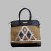 Weekend Kilim Genuine Leather Bag is Handcrafted in Old Cairo, Egypt, This bag is one of a kind  masterpiece, made from vintage fabrics and genuine leather to embody the essence of sustainable luxury.a gift to the world of Ancient craftsmanship meeting modern functionality. A statement of creativity, cultural awareness and limitless style.