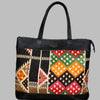 Weekend Kilim Genuine Leather Bag XL size is Handcrafted in Old Cairo, Egypt, This bag is one of a kind  masterpiece, made from vintage fabrics and genuine leather to embody the essence of sustainable luxury.a gift to the world of Ancient craftsmanship meeting modern functionality. A statement of creativity, cultural awareness and limitless style.