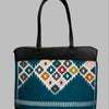 Weekend Kilim Genuine Leather Bag XL size is Handcrafted in Old Cairo, Egypt, This bag is one of a kind  masterpiece, made from vintage fabrics and genuine leather to embody the essence of sustainable luxury.a gift to the world of Ancient craftsmanship meeting modern functionality. A statement of creativity, cultural awareness and limitless style.