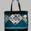 Weekend Kilim Genuine Leather Bag XL size is Handcrafted in Old Cairo, Egypt, This bag is one of a kind  masterpiece, made from vintage fabrics and genuine leather to embody the essence of sustainable luxury.a gift to the world of Ancient craftsmanship meeting modern functionality. A statement of creativity, cultural awareness and limitless style.