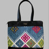 Weekend Kilim Genuine Leather Bag XL size is Handcrafted in Old Cairo, Egypt, This bag is one of a kind  masterpiece, made from vintage fabrics and genuine leather to embody the essence of sustainable luxury.a gift to the world of Ancient craftsmanship meeting modern functionality. A statement of creativity, cultural awareness and limitless style.