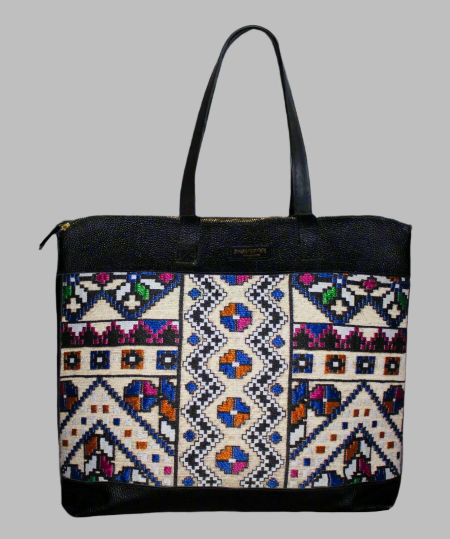 Weekend Kilim Genuine Leather Bag XL size is Handcrafted in Old Cairo, Egypt, This bag is one of a kind  masterpiece, made from vintage fabrics and genuine leather to embody the essence of sustainable luxury.a gift to the world of Ancient craftsmanship meeting modern functionality. A statement of creativity, cultural awareness and limitless style.