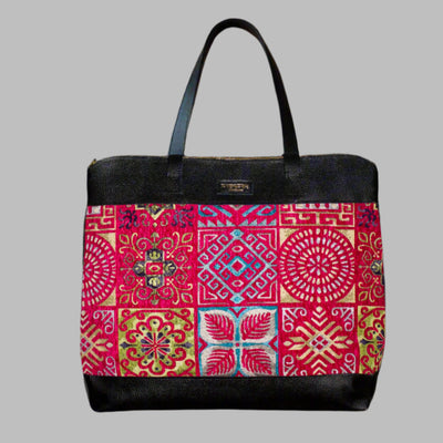 Weekend Kilim Genuine Leather Bag XL size is Handcrafted in Old Cairo, Egypt, This bag is one of a kind  masterpiece, made from vintage fabrics and genuine leather to embody the essence of sustainable luxury.a gift to the world of Ancient craftsmanship meeting modern functionality. A statement of creativity, cultural awareness and limitless style.