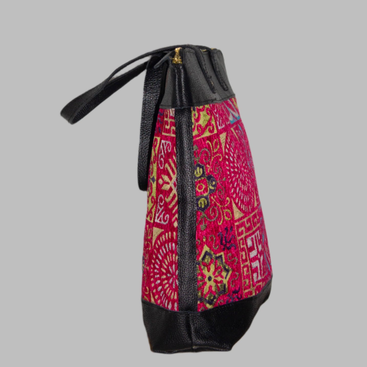 Weekend Kilim Genuine Leather Bag XL size is Handcrafted in Old Cairo, Egypt, This bag is one of a kind  masterpiece, made from vintage fabrics and genuine leather to embody the essence of sustainable luxury.a gift to the world of Ancient craftsmanship meeting modern functionality. A statement of creativity, cultural awareness and limitless style.