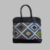Weekend Kilim Genuine Leather Bag is Handcrafted in Old Cairo, Egypt, This bag is one of a kind  masterpiece, made from vintage fabrics and genuine leather to embody the essence of sustainable luxury.a gift to the world of Ancient craftsmanship meeting modern functionality. A statement of creativity, cultural awareness and limitless style.
