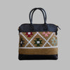Weekend Kilim Genuine Leather Bag is Handcrafted in Old Cairo, Egypt, This bag is one of a kind  masterpiece, made from vintage fabrics and genuine leather to embody the essence of sustainable luxury.a gift to the world of Ancient craftsmanship meeting modern functionality. A statement of creativity, cultural awareness and limitless style.