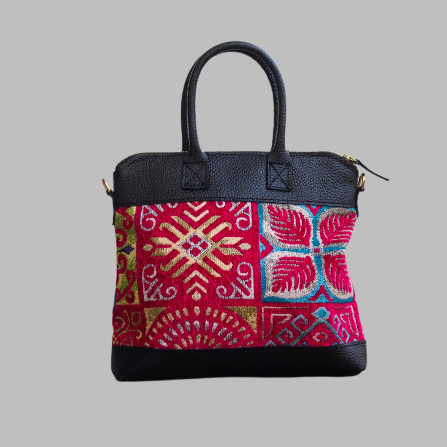 Weekend Kilim Genuine Leather Bag is Handcrafted in Old Cairo, Egypt, This bag is one of a kind  masterpiece, made from vintage fabrics and genuine leather to embody the essence of sustainable luxury.a gift to the world of Ancient craftsmanship meeting modern functionality. A statement of creativity, cultural awareness and limitless style.