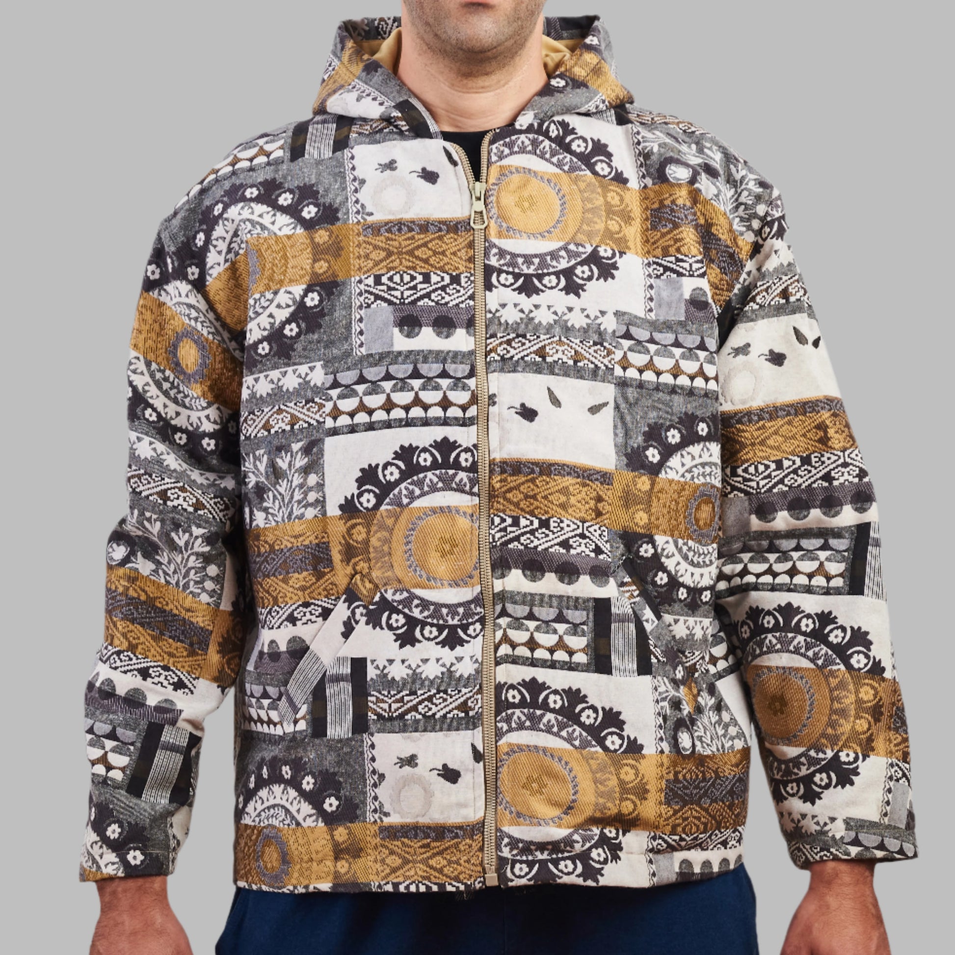 Experience a Unique blend of Heritage and Streetwear with the Eastern Majesty Zip Top Hoodie. Crafted from authentic 80s and 90s vintage fabrics, this 100% cotton hoodie offers a premium feel with a soft napped interior for extra warmth. Designed for a relaxed, oversized fit, it’s available in size L , making it a versatile addition to any wardrobe.