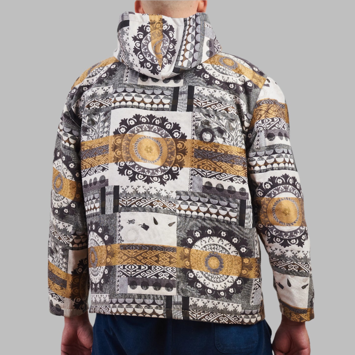 Experience a Unique blend of Heritage and Streetwear with the Eastern Majesty Zip Top Hoodie. Crafted from authentic 80s and 90s vintage fabrics, this 100% cotton hoodie offers a premium feel with a soft napped interior for extra warmth. Designed for a relaxed, oversized fit, it’s available in size L , making it a versatile addition to any wardrobe.