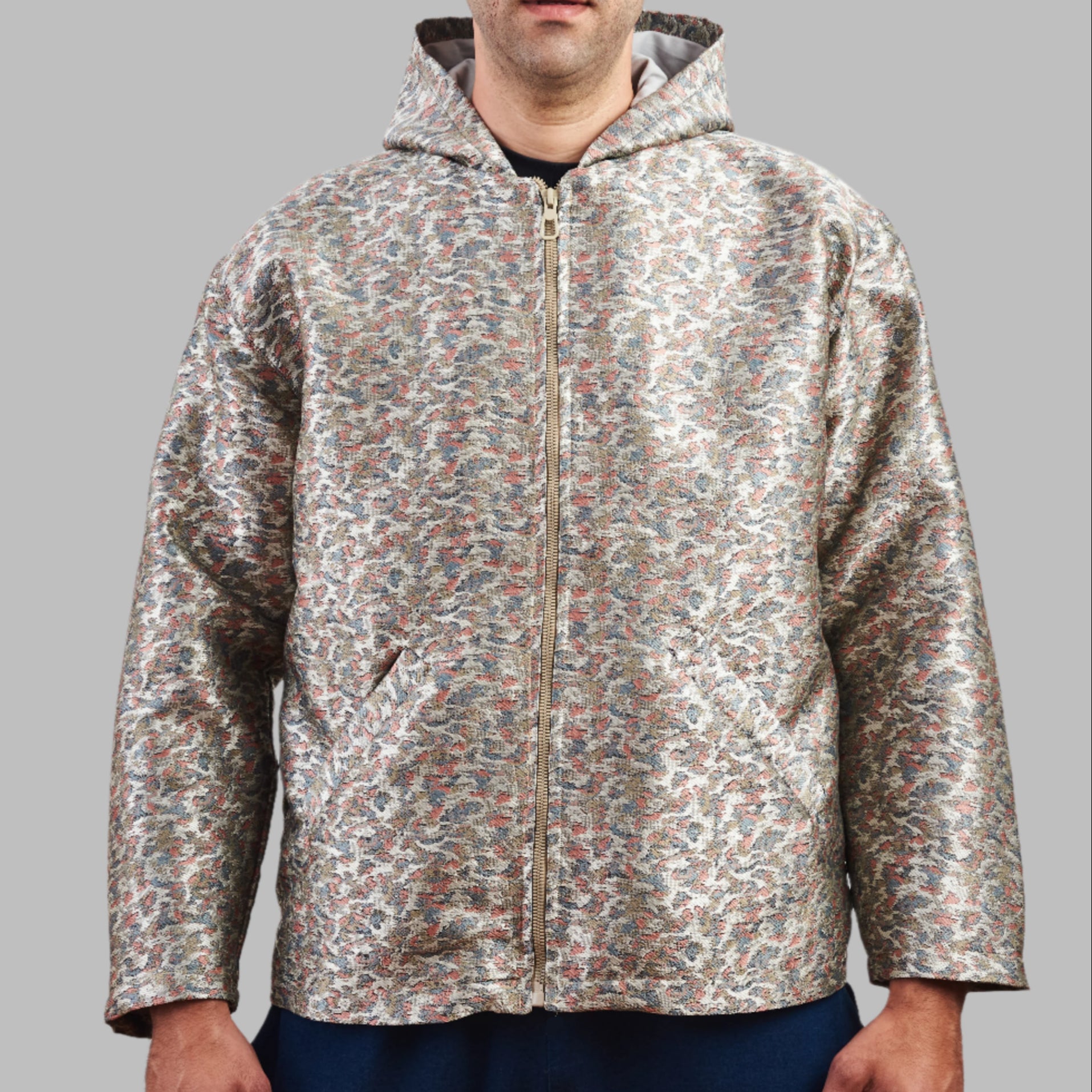 Experience a Unique blend of Heritage and Streetwear with the Eastern Majesty Zip Top Hoodie. Crafted from authentic 80s and 90s vintage fabrics, this 100% cotton hoodie offers a premium feel with a soft napped interior for extra warmth. Designed for a relaxed, oversized fit, it’s available in size L , making it a versatile addition to any wardrobe.