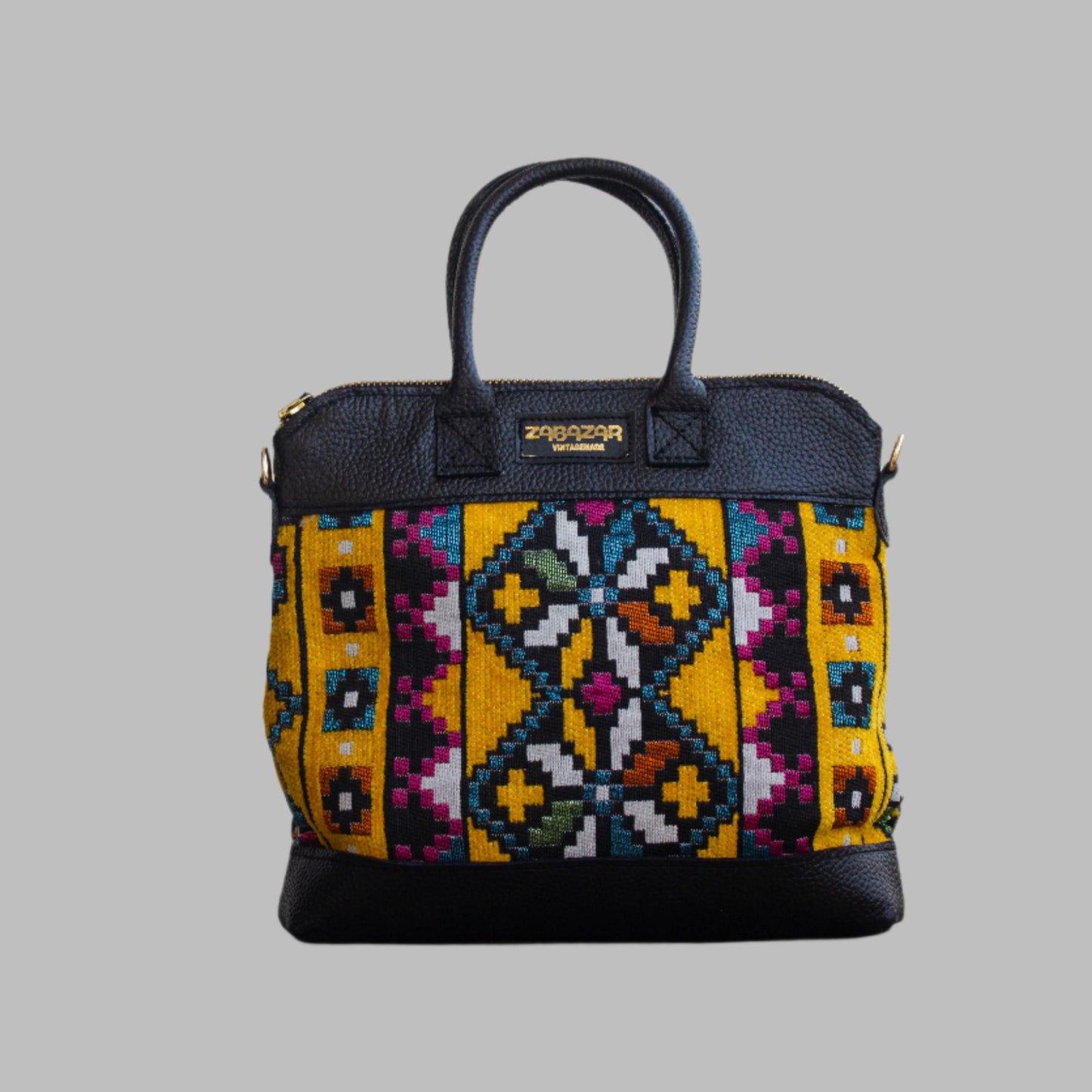 Weekend Kilim Genuine Leather Bag is Handcrafted in Old Cairo, Egypt, This bag is one of a kind  masterpiece, made from vintage fabrics and genuine leather to embody the essence of sustainable luxury.a gift to the world of Ancient craftsmanship meeting modern functionality. A statement of creativity, cultural awareness and limitless style.