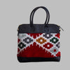 Weekend Kilim Genuine Leather Bag is Handcrafted in Old Cairo, Egypt, This bag is one of a kind  masterpiece, made from vintage fabrics and genuine leather to embody the essence of sustainable luxury.a gift to the world of Ancient craftsmanship meeting modern functionality. A statement of creativity, cultural awareness and limitless style.