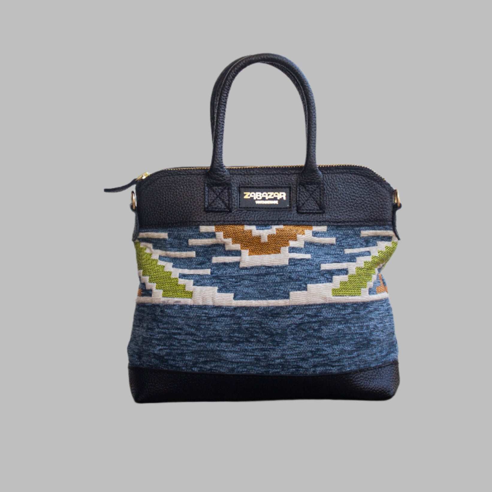 Weekend Kilim Genuine Leather Bag is Handcrafted in Old Cairo, Egypt, This bag is one of a kind  masterpiece, made from vintage fabrics and genuine leather to embody the essence of sustainable luxury.a gift to the world of Ancient craftsmanship meeting modern functionality. A statement of creativity, cultural awareness and limitless style.