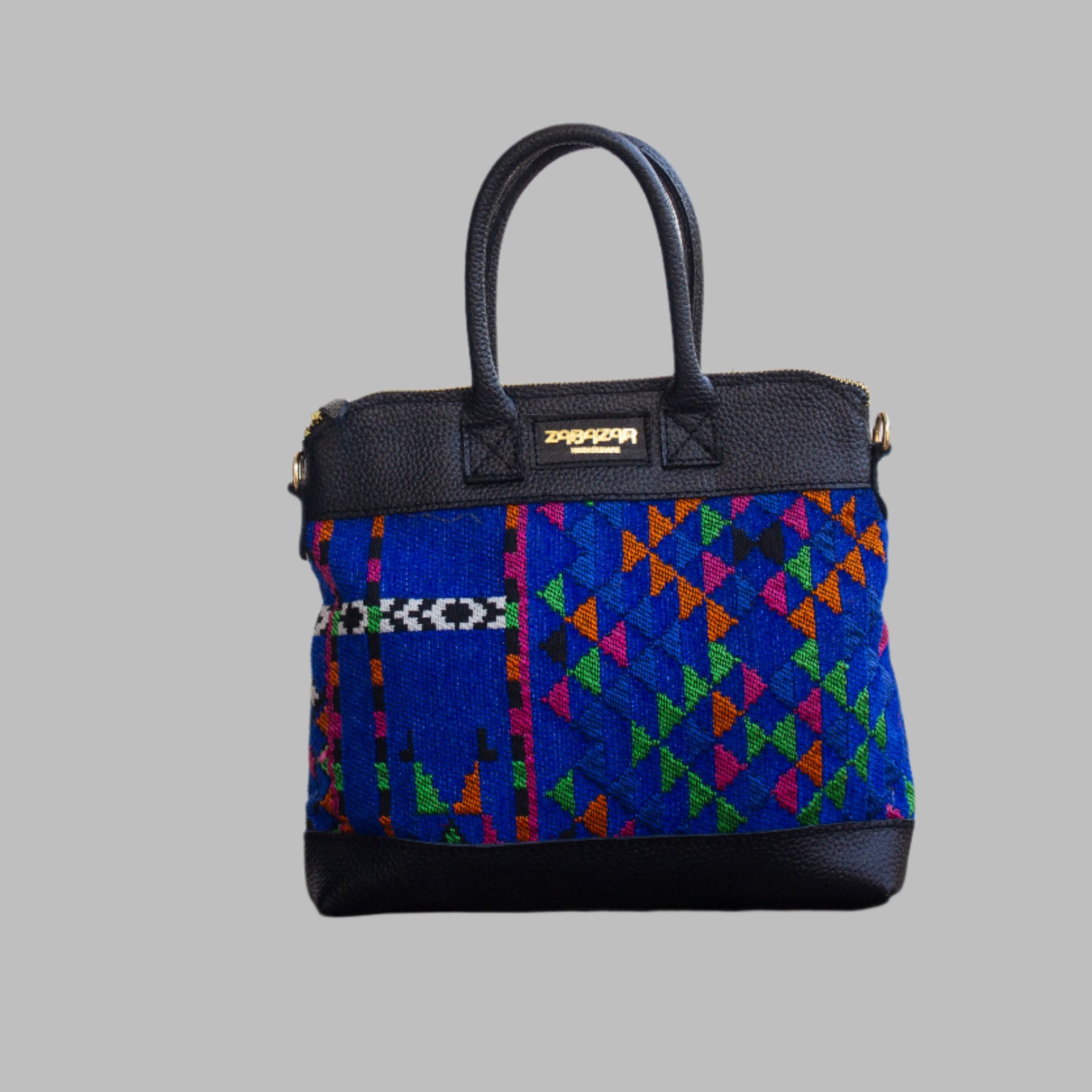 Weekend Kilim Genuine Leather Bag is Handcrafted in Old Cairo, Egypt, This bag is one of a kind  masterpiece, made from vintage fabrics and genuine leather to embody the essence of sustainable luxury.a gift to the world of Ancient craftsmanship meeting modern functionality. A statement of creativity, cultural awareness and limitless style.
