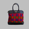 Weekend Kilim Genuine Leather Bag is Handcrafted in Old Cairo, Egypt, This bag is one of a kind  masterpiece, made from vintage fabrics and genuine leather to embody the essence of sustainable luxury.a gift to the world of Ancient craftsmanship meeting modern functionality. A statement of creativity, cultural awareness and limitless style.