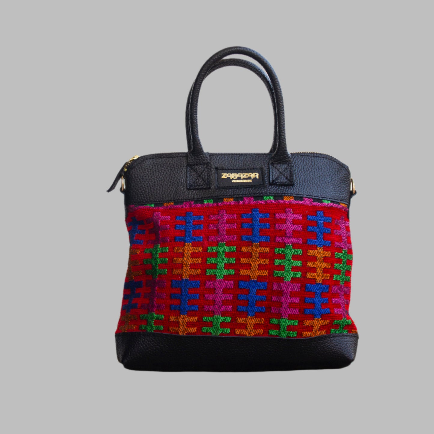 Weekend Kilim Genuine Leather Bag is Handcrafted in Old Cairo, Egypt, This bag is one of a kind  masterpiece, made from vintage fabrics and genuine leather to embody the essence of sustainable luxury.a gift to the world of Ancient craftsmanship meeting modern functionality. A statement of creativity, cultural awareness and limitless style.