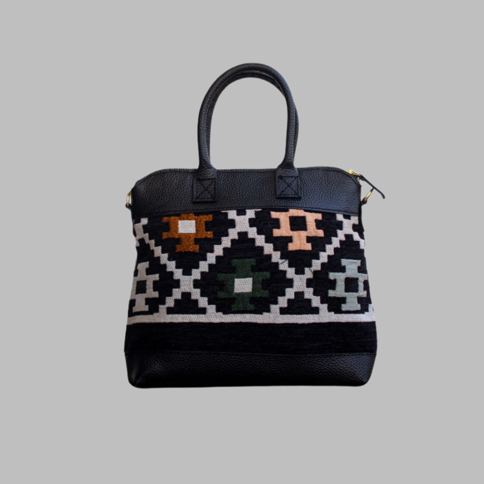 Weekend Kilim Genuine Leather Bag is Handcrafted in Old Cairo, Egypt, This bag is one of a kind  masterpiece, made from vintage fabrics and genuine leather to embody the essence of sustainable luxury.a gift to the world of Ancient craftsmanship meeting modern functionality. A statement of creativity, cultural awareness and limitless style.