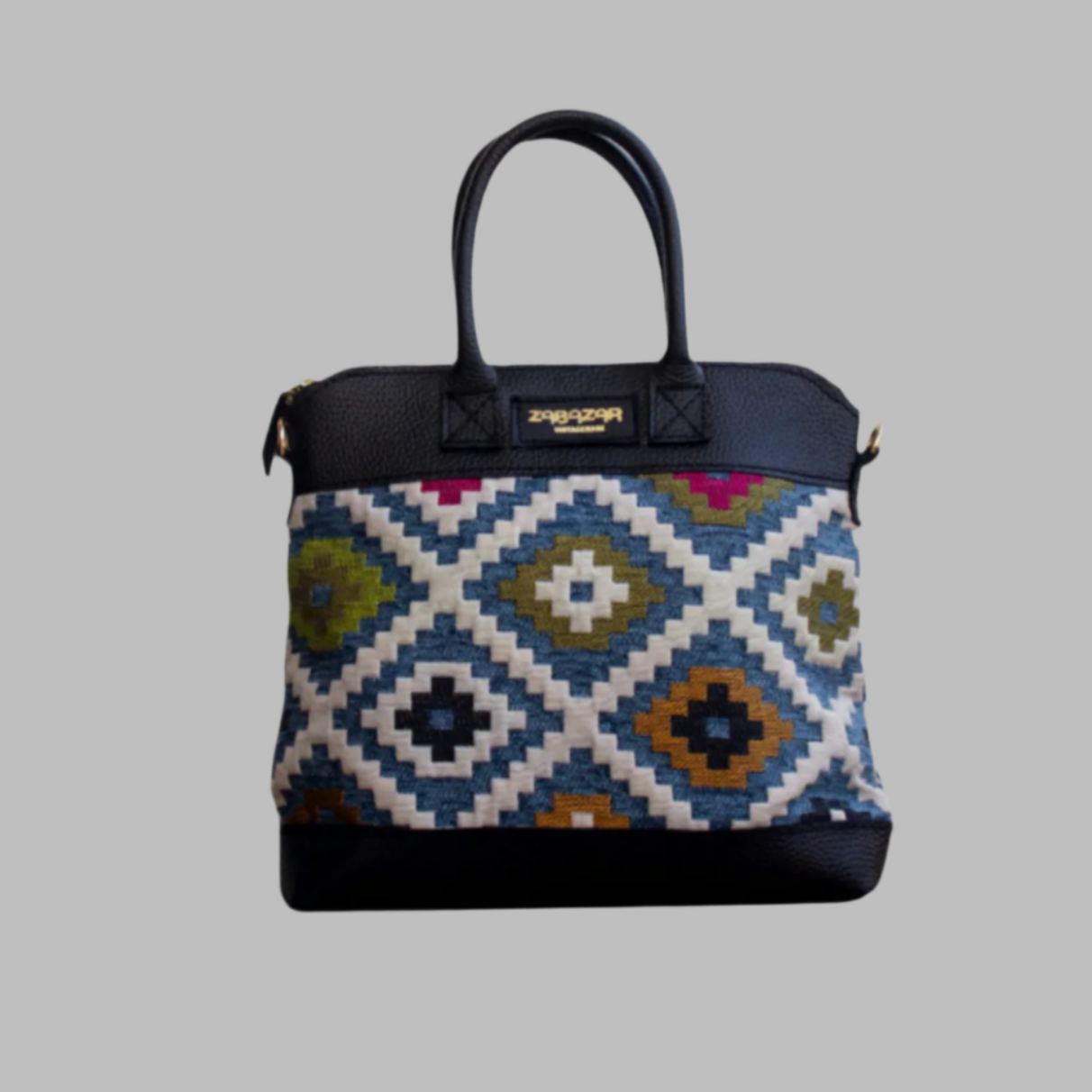 Weekend Kilim Genuine Leather Bag is Handcrafted in Old Cairo, Egypt, This bag is one of a kind  masterpiece, made from vintage fabrics and genuine leather to embody the essence of sustainable luxury.a gift to the world of Ancient craftsmanship meeting modern functionality. A statement of creativity, cultural awareness and limitless style.