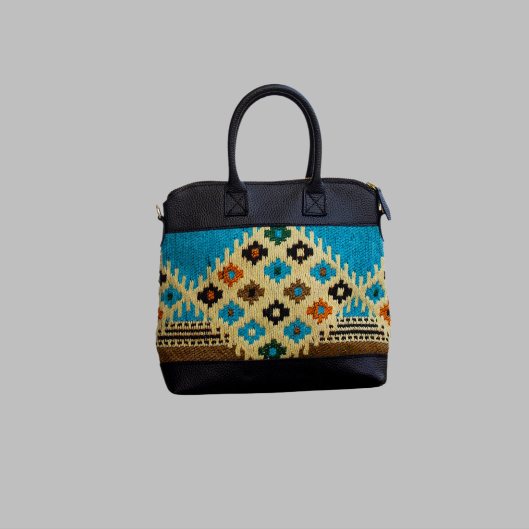 Weekend Kilim Genuine Leather Bag is Handcrafted in Old Cairo, Egypt, This bag is one of a kind  masterpiece, made from vintage fabrics and genuine leather to embody the essence of sustainable luxury.a gift to the world of Ancient craftsmanship meeting modern functionality. A statement of creativity, cultural awareness and limitless style.