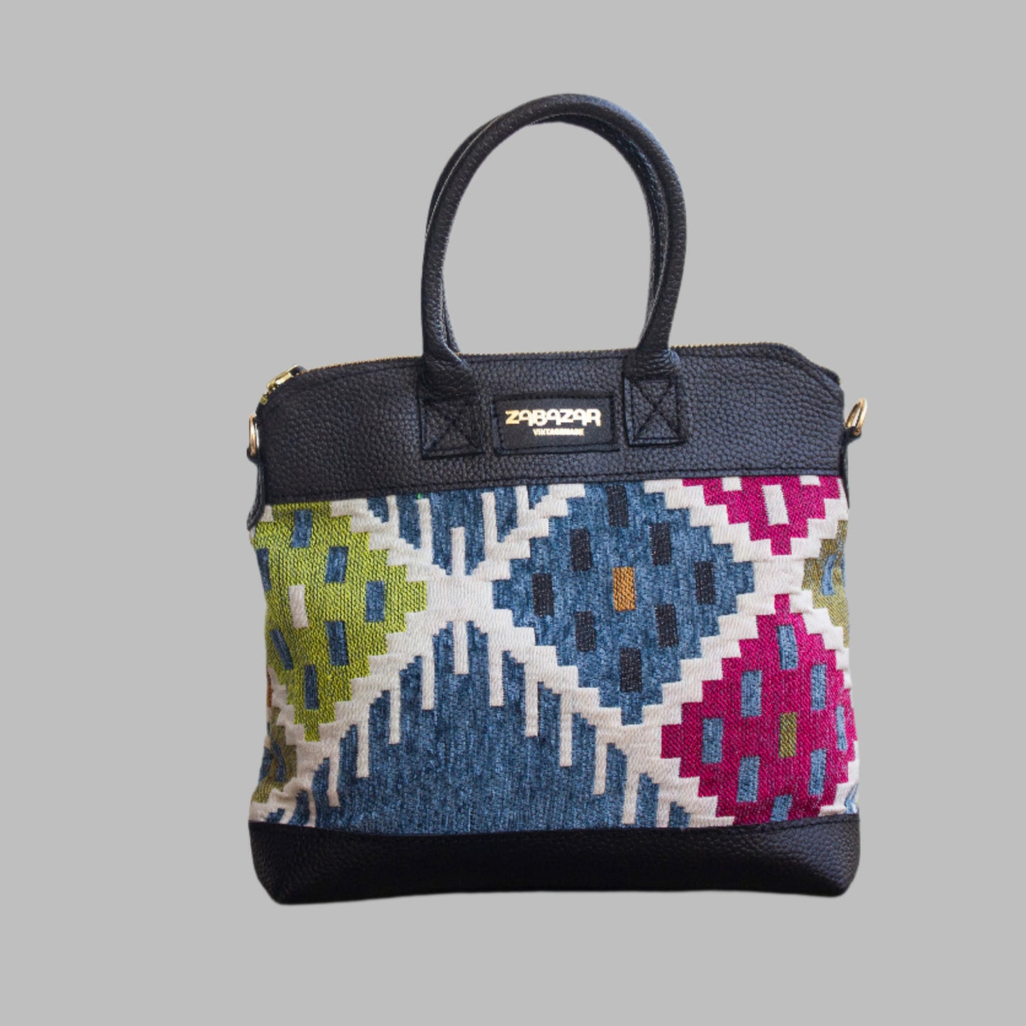 Weekend Kilim Genuine Leather Bag is Handcrafted in Old Cairo, Egypt, This bag is one of a kind  masterpiece, made from vintage fabrics and genuine leather to embody the essence of sustainable luxury.a gift to the world of Ancient craftsmanship meeting modern functionality. A statement of creativity, cultural awareness and limitless style.