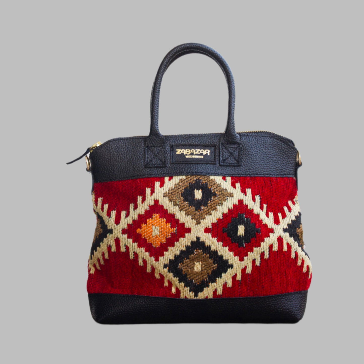 
Weekend Kilim Genuine Leather Bag is Handcrafted in Old Cairo, Egypt, This bag is one of a kind  masterpiece, made from vintage fabrics and genuine leather to embody the essence of sustainable luxury.a gift to the world of Ancient craftsmanship meeting modern functionality. A statement of creativity, cultural awareness and limitless style.