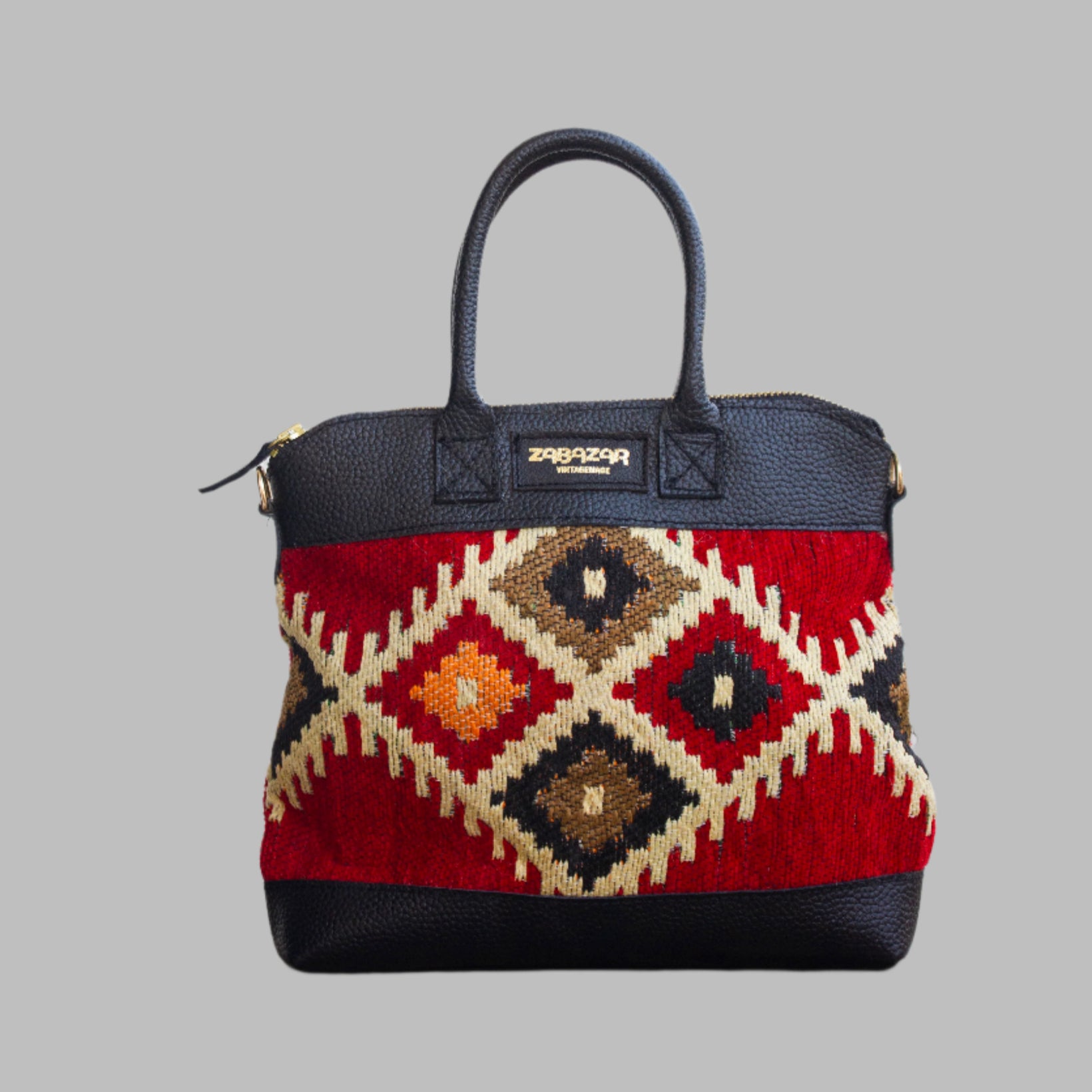 
Weekend Kilim Genuine Leather Bag is Handcrafted in Old Cairo, Egypt, This bag is one of a kind  masterpiece, made from vintage fabrics and genuine leather to embody the essence of sustainable luxury.a gift to the world of Ancient craftsmanship meeting modern functionality. A statement of creativity, cultural awareness and limitless style.
